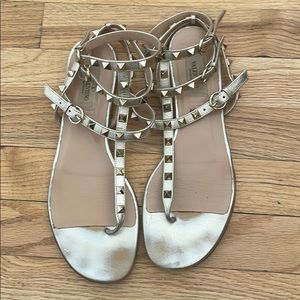 Valentino rock stud metallic gladiator sandals.